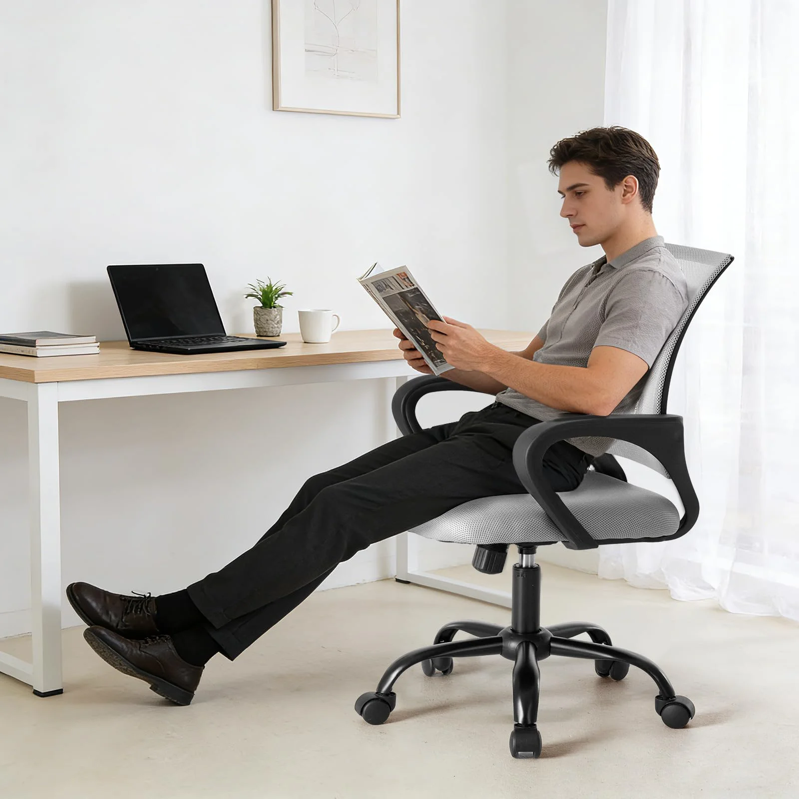 The eight-hour sit, held to the checklist: back supported, elbows close, feet flat.